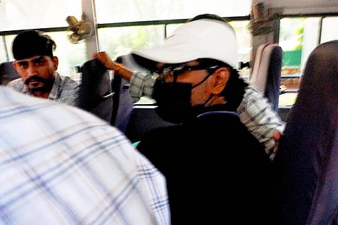 Mohammed Zubair, Alt News Co-founder, sitting in a Delhi police van while in custody of Delhi police