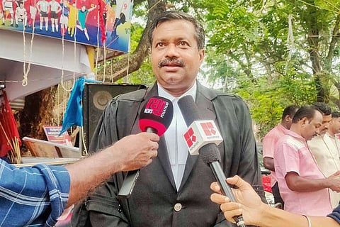 An image of senior lawyer Mohanraj
