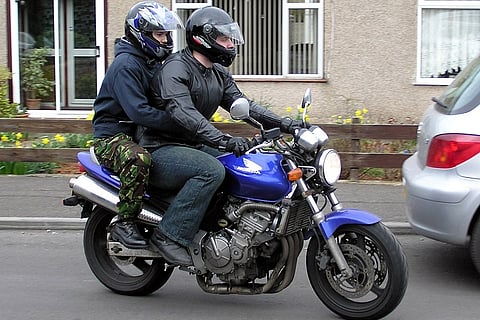 Pillion riders in urban Karnataka, don't forget your helmet 