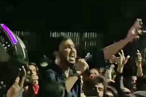 A muslim youth giving speech near Hyderabad city police headquarters. 