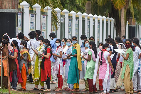 NEET students walking into exam hall
