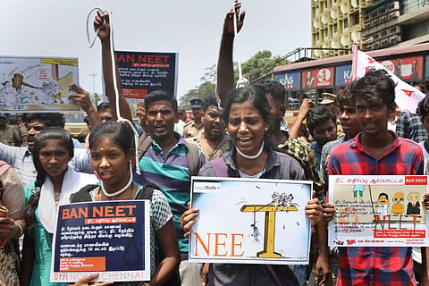Members of Students' Federation of India (DYFI) stage a protest to seek scrapping of National Eligibility cum Entrance Test (NEET) in Tamil Nadu