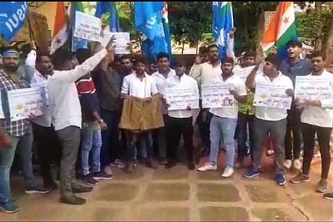 NSUI students protesting against BC Nagesh in Tumakuru