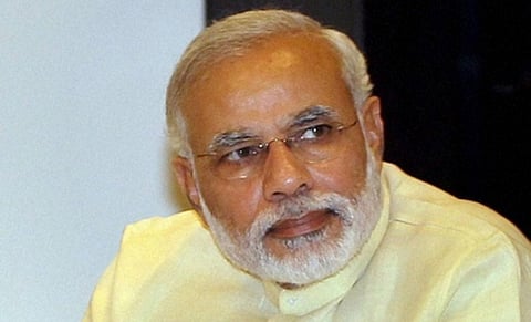 Modi, Rajnath assure Kerala CM Chandy of all help from centre for Kollam fire tragedy