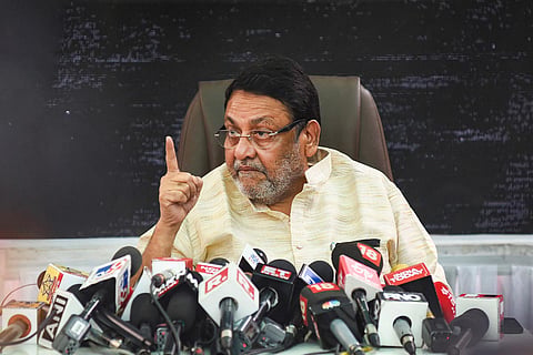 Maharashtra Minister Nawab Malik addressing a press conference