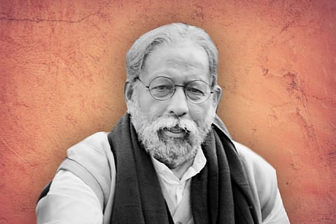 Nedumudi Venu with a black shawl around his neck