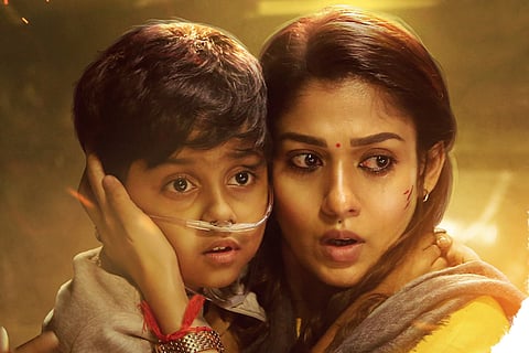 Rithvik and Nayanthara in a scene from O2