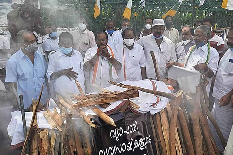 Mock funeral pyre protest