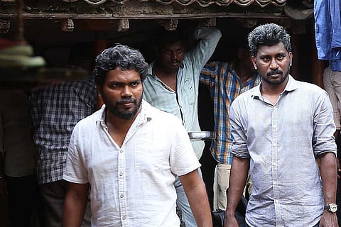 Pa Ranjith and writer Tamil Prabha on sets of Sarpatta Parambarai