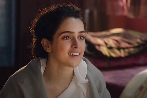Sanya Malhotra dressed in a salwar with a grey shawl around her shoulders in Pagglait