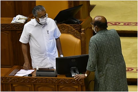 Kerala Chief Minister Pinarayi Vijayan and Finance Minister Thomas Isaac . 