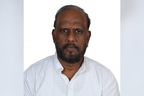 An image of late lyricist Piraisoodan