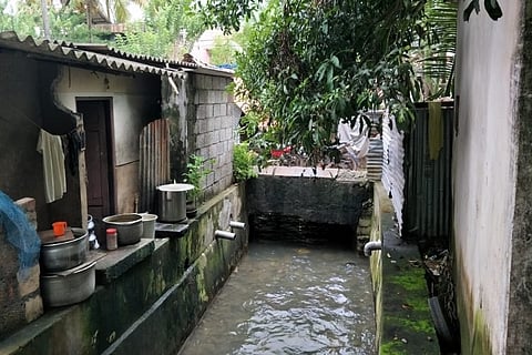 Barely 2 kilometres from Kollam Corporation Office, a colony lives with open drains, no toilets