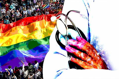 Representative image of a doctor in the backdrop of LGBTQIA+ flag 
