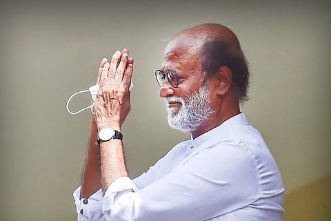 Actor Rajinikanth raising his folded hands in front of his face