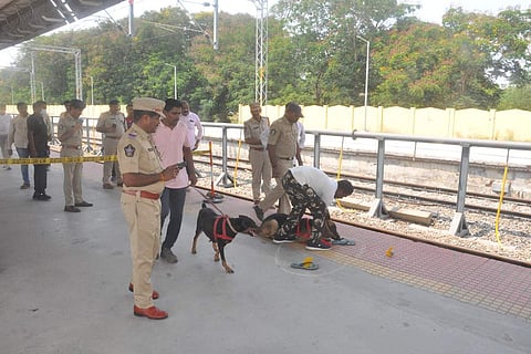 Police team investigating with dog squad at Repalle railway station