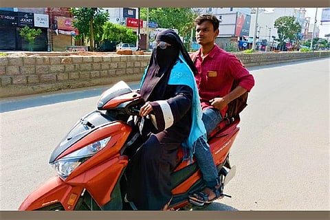 Mom rides 1,400 km on scooter to bring back son stranded in lockdown