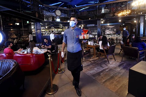 Representative image of a waiter in a restaurant