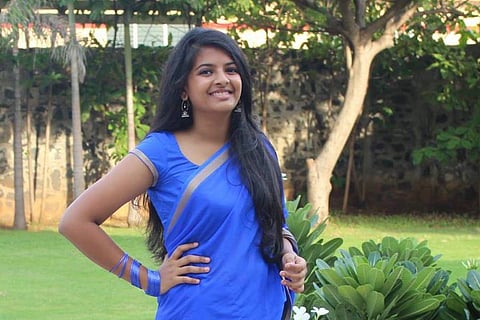 Riya Gupta in a blue saree 