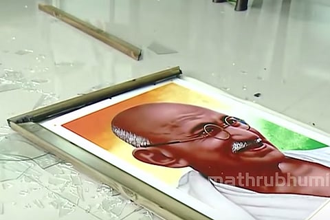 The damaged Mahatma Gandhi protrait