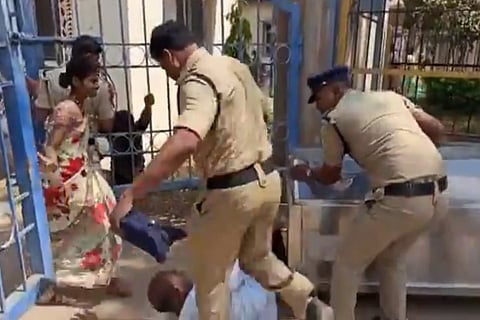 Telangana cop caught on camera kicking a distraught father whose daughter was found dead