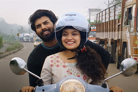 Anna Ben and Sunny Wayne riding a scooter in Sara's 