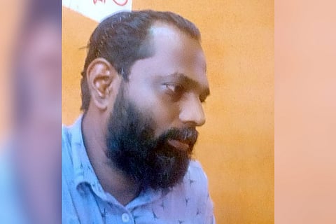 Kerala entrepreneur Sarin Mohan in a blue shirt, looking away from the camera