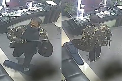 Screengrab of CCTV footage of man brandishing a sword in Sathiyam News channel office in Royapuram Chennai