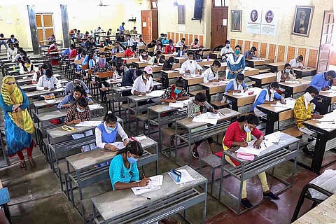 School students writing exam