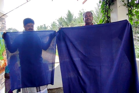 Parents of government school children in Gubbi, Tumakuru display the thin material supplied for uniforms