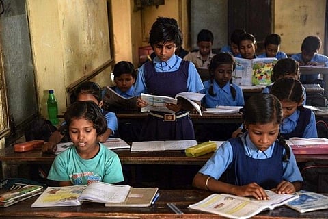 Students reading in a classroom