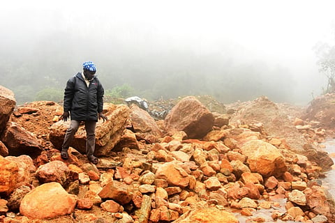 Shanmuganathan at Pettimudi landslide site