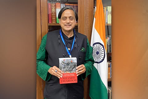 Shashi Tharoor with his new book