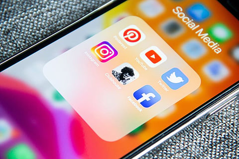 A mobile phone screen showing social media application icons