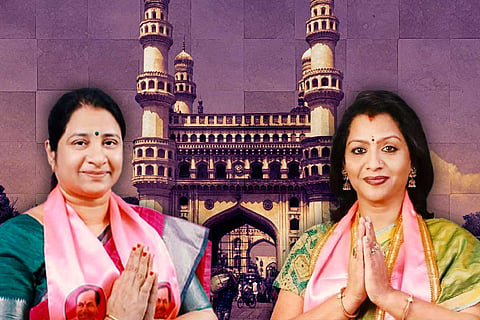 Newly elected GHMC Dy Mayor Sri Latha Reddy (left) and GHMC Mayor Gadwal Vijayalakshmi with folded hands, with Charminar in the background
