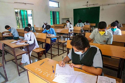 students writing exam