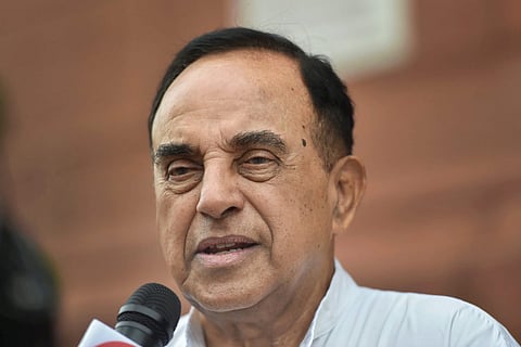 BJP MP Subramanian Swamy talks to the media outside the Parliament
