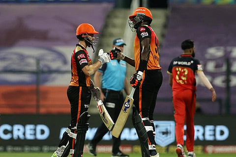 Jason Holder and Kane Williamson