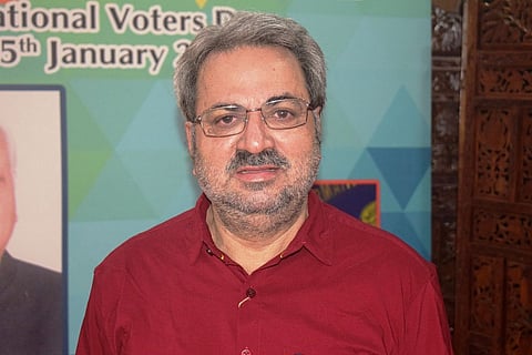 Kerala Chief Electoral Officer Teeka Ram Meena in a maroon shirt 