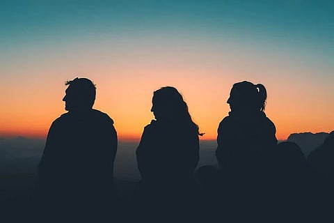 Silhouette of friends hanging out