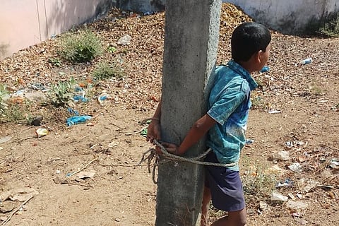 Telangana father ties minor son to pole for skipping school, activists demand action