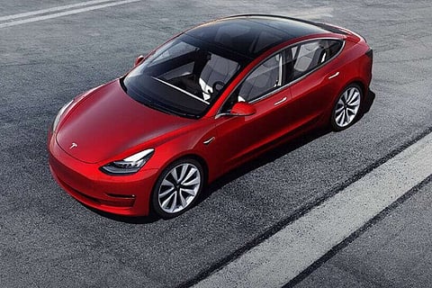 Tesla announces entry-level Model 3 sedan for $35,000, to be sold only online