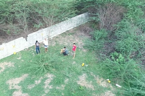 Four men detected by a police drone while drinking in an open ground