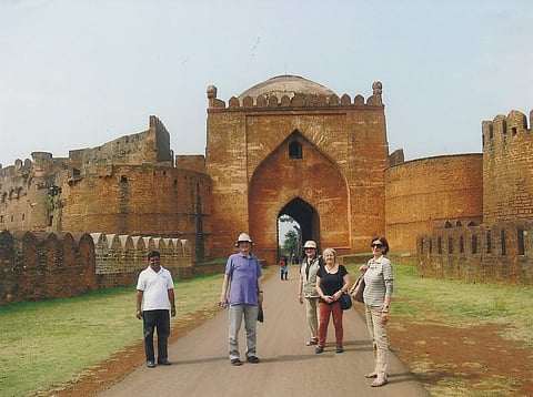 Tourist guide along with tourists