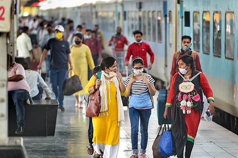 People at a railway station 