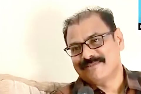 Sharaf Ali in specs 