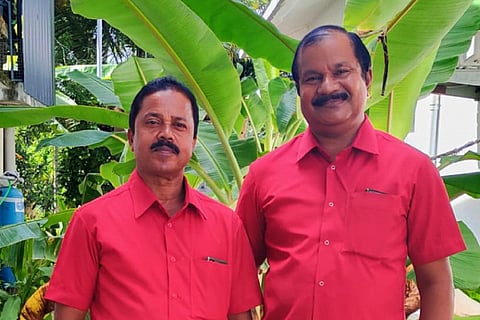 Udayakumar and Raveendran in matching shirts