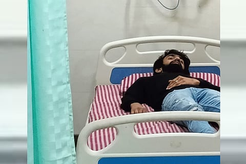 Saif, brother of one of the hijab case petitioners, in a hospital in Udupi
