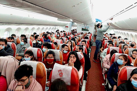 Ukraine returnees on flight