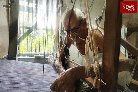 A busy weaver on loom